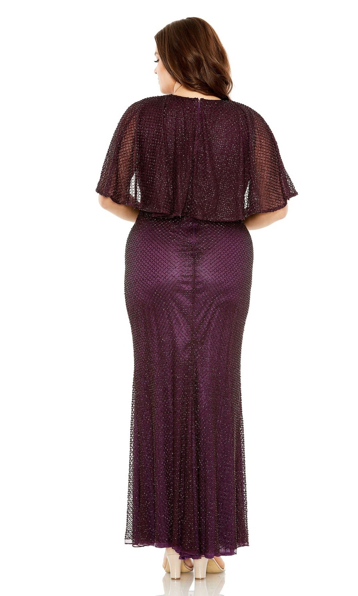 A woman is shown from the back against a white background wearing the Long Plus-Size Prom Dress 5948 by Mac Duggal—an amethyst purple, fitted gown featuring a sheer short-sleeved overlay.